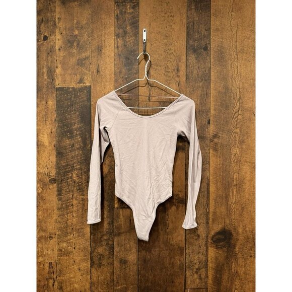 Lululemon Tops - Lululemon One Piece Body Suit Pink Size 4 EUC